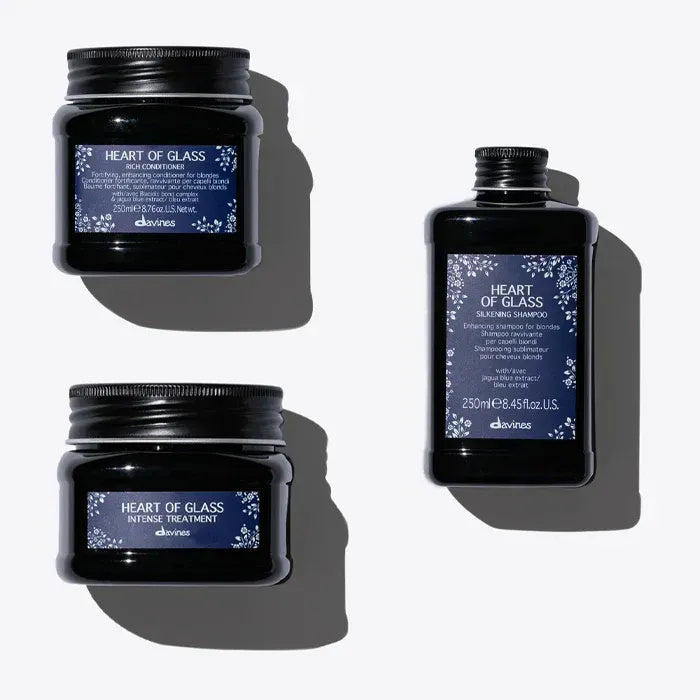 Variety of vegan haircare products on a bathroom shelf, highlighting natural and ethical beauty choices
